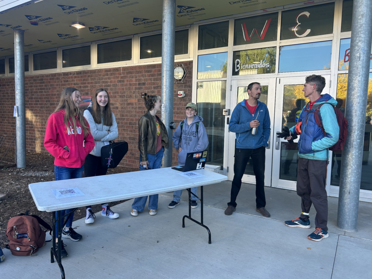 Aisha O’Neil, Audrey Toppin, Sophia Valdez, Halldor Vanderbilt, Mr. Wilson, and Mr. Szech run the bike to school week stand on October 5, 2023. They are the members of the Green Team running the stand and had a large part in bringing this event to DHS.