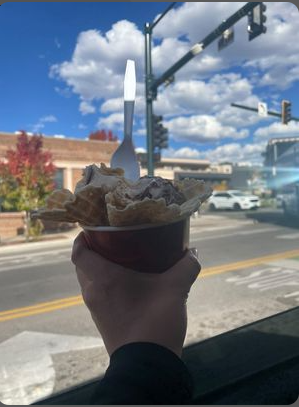 Paloma Romero in downtown Durango, with Coldstone's Pumpkin pie batter and vanilla ice cream.