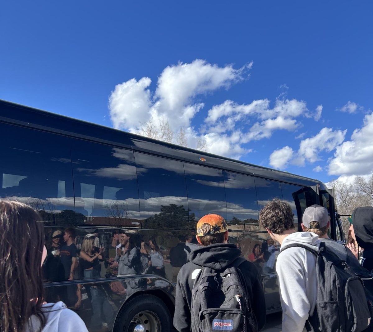 The DHS hockey team getting off of the bus after their state championship win against Summit on March 6th, 2024. The students traveled and missed multiple days of school to play in the game. 