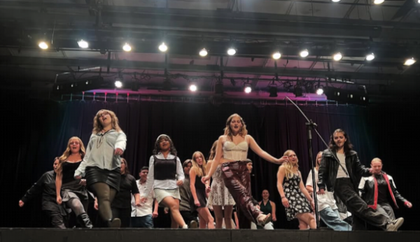 Here is concert choir dancing and singing the song Uptown girl by Billy Joel