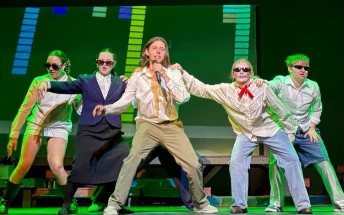 Cast Roller performs "This Song is Awesome" during a tech rehearsal 